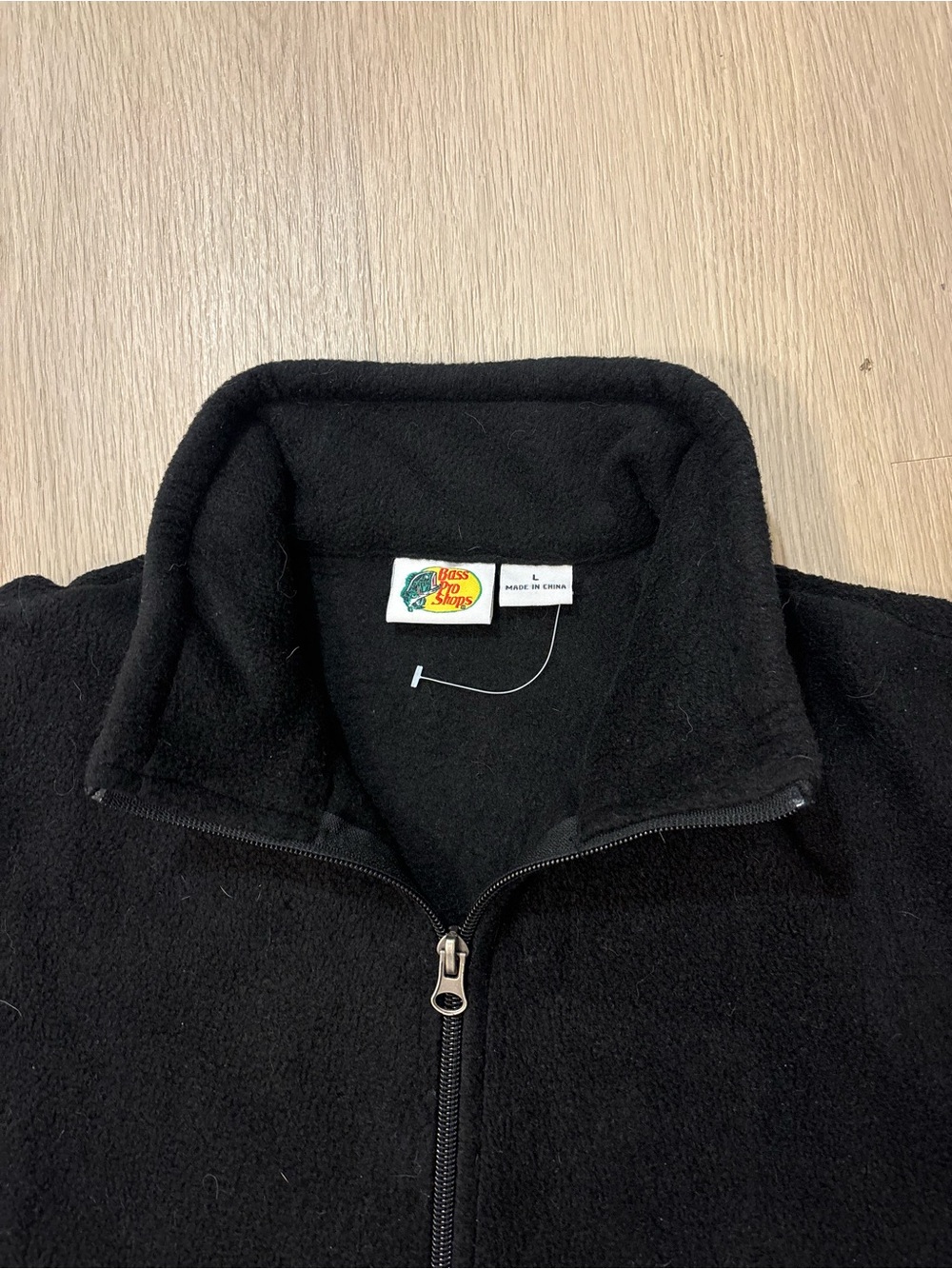 Bass Pro Shops black full-zip fleece jacket